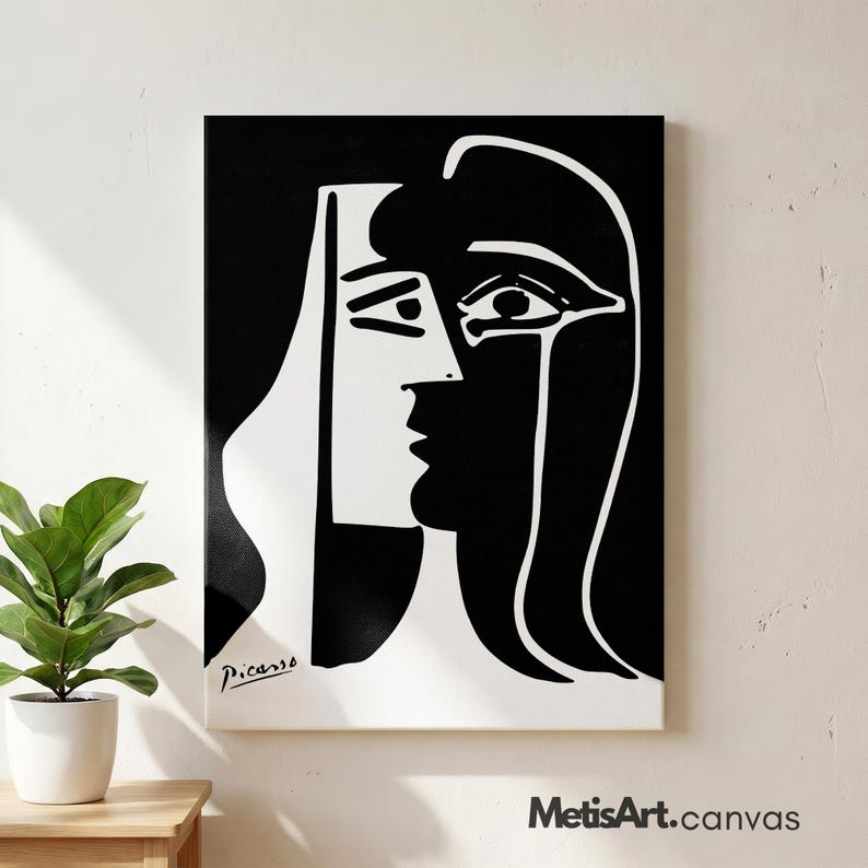 May include: A rectangular canvas print featuring a high-contrast black and white abstract portrait. The artwork displays a stylized face with bold lines and geometric shapes, including the signature Picasso in the bottom left corner.