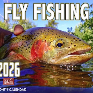 May include: A 16-month calendar featuring a close-up of a colorful trout in water. The calendar has the text "FLY FISHING" at the top and "2026" at the bottom. The King.Co logo is also visible.