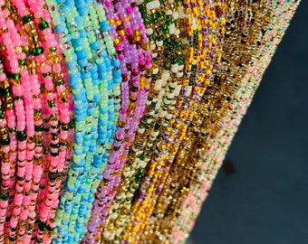 Veelkleurige taillekralen: traditionele buikketting met kralen, gemaakt in Ghana