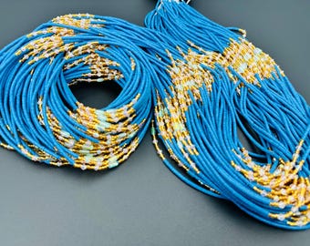 Groothandel vinyl taillekralen – blauw, goud, andere kleuren kristalaccenten – lengte 50 inch – katoenen strengen