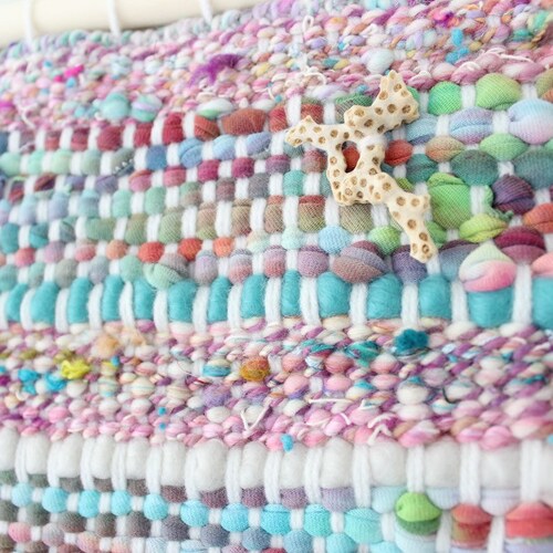 Woven wall hanging with handspun pink art yarn and repurposed offers tie-dyed t-shirt yarn