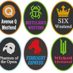 May include: A set of six oval embroidered patches with black fabric bases and colourful borders. The patches feature various theatrical designs and text including Avenue Q Westend, Beetlejuice Westend, SIX Westend, Phantom of the Opera, Starlight Express, and Wicked Liverpool in diverse fonts and colours.