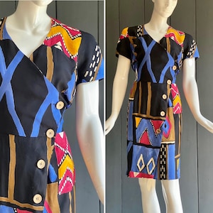 Vintage 80s wrap dress with short sleeves, colorful African/ethnic patterns on black background, size 40/M