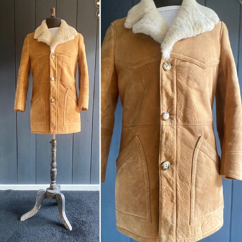 May include: A brown suede jacket with a shearling collar. The jacket has a button front closure and two large pockets on the front.