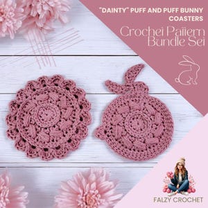 May include: Two crocheted coasters, one round and one shaped like a bunny, in a dusty rose color. The coasters are on a white wooden surface with pink flowers. The text "DAINTY" PUFF AND PUFF BUNNY COASTERS Crochet Pattern Bundle Set" is at the top of the image. The text "FALZY CROCHET" is at the bottom of the image.