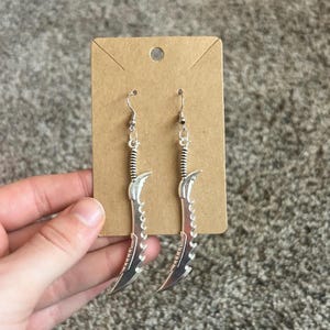 Unique sword novelty earrings