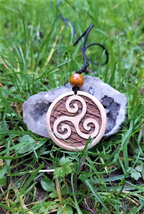 Wooden medallion best sale necklace