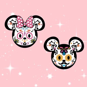 May include: Two cartoon mouse heads with Day of the Dead sugar skull makeup. The mouse on the left has a pink bow and the mouse on the right has a butterfly on its nose. Both are on a pink background with white stars.