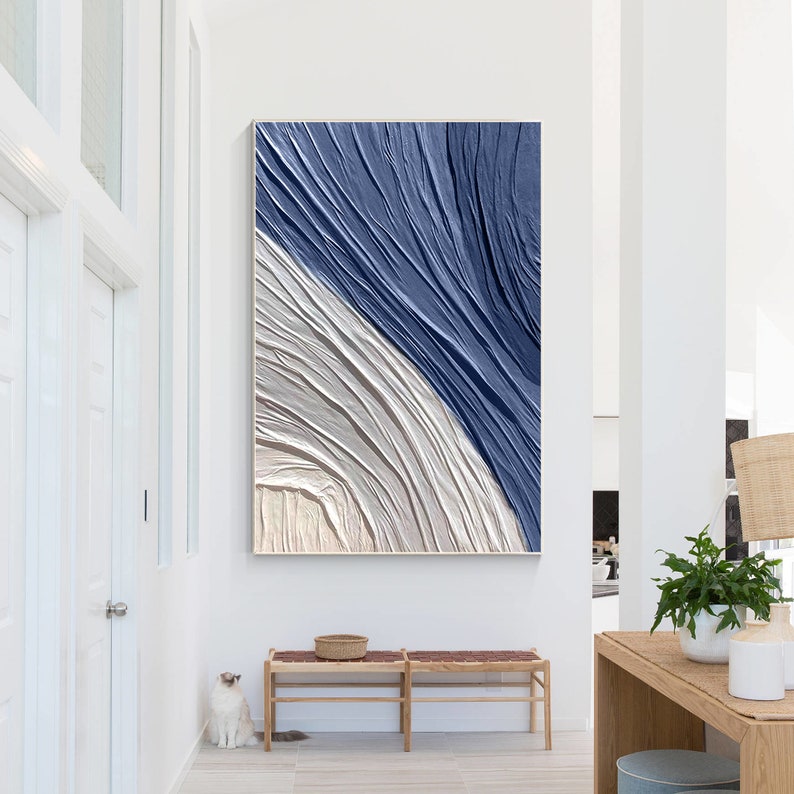 Large blue abstract wall art with textured layers in navy blue and gray tones for living room