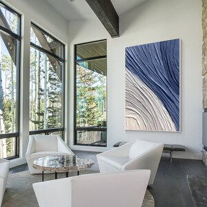 Contemporary framed blue and white textured wall art with dimensional raised features