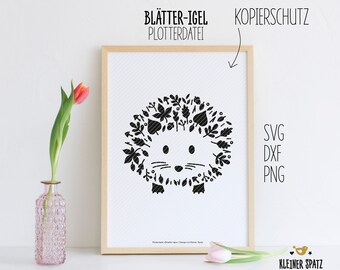 May include: Black and white digital illustration of a hedgehog made of leaves. The image is framed and has the text "Blättter-Igel Plotterdatei" and "KopierSchutz" above the image. The text "SVG DXF PNG" is on the right side of the image.
