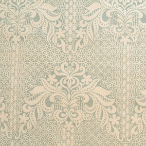 May include: A light blue fabric with a white damask pattern. The pattern features intricate floral and leaf designs.