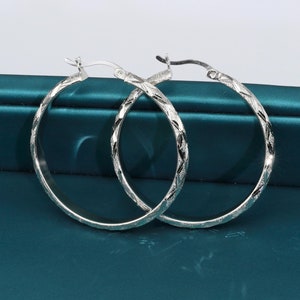 Brilliant Sterling Silver Round Diamond-cut and Laser-cut Finish X-pattern Tubular Hoop Earrings, 30mm 35mm 45mm Available, By TILO Jewelry