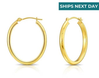thumbnail interactive-video image 1 of Sparkle XOXO Women's Real Gold Plated Teardrop 1.5 Inch Oval Hoop Earrings - Brass 1 of 2