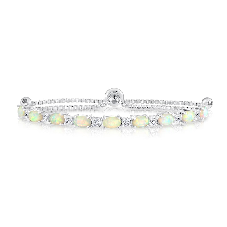 May include: A silver adjustable bracelet with a row of oval-shaped white opals and small round white diamonds.
