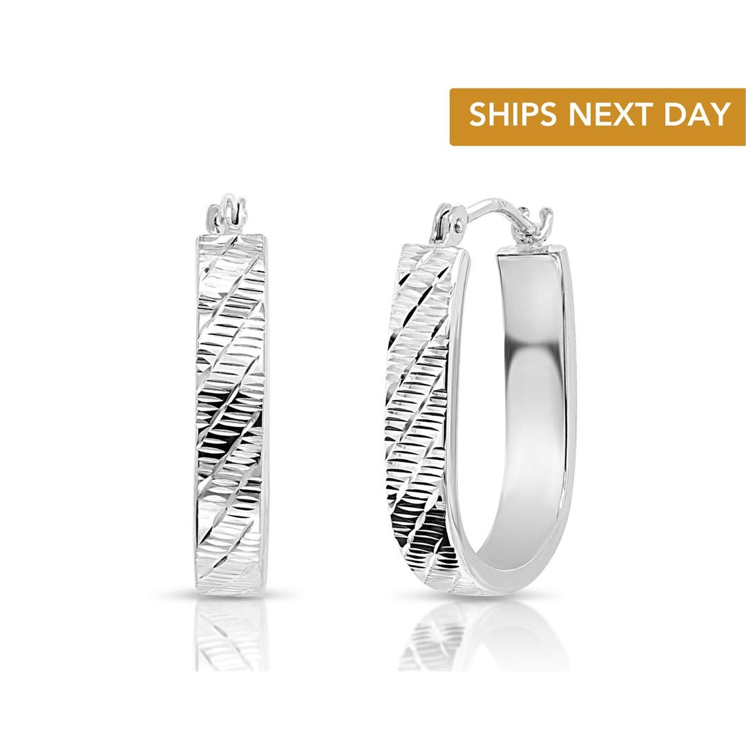 14k White Gold Slim Oval Shape Hoop Earrings main image 1