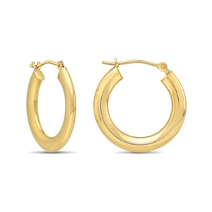 May include: A pair of polished 14k yellow gold hoop earrings with a smooth, rounded tube design. The earrings feature a secure hinged post closure mechanism, showcasing a classic circular shape with a high-shine reflective metallic finish.