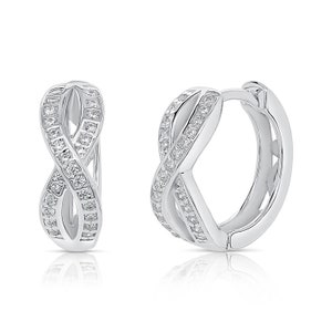 May include: Silver hoop earrings with a double infinity design, accented with small clear cubic zirconia stones.