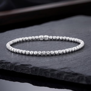 Sterling Silver Diamond-Cut "Tiger" Bead Stretch Bracelet, Italian Design Bracelet, Fits 6.5" - 7.5" Wrists, By TILO Jewelry