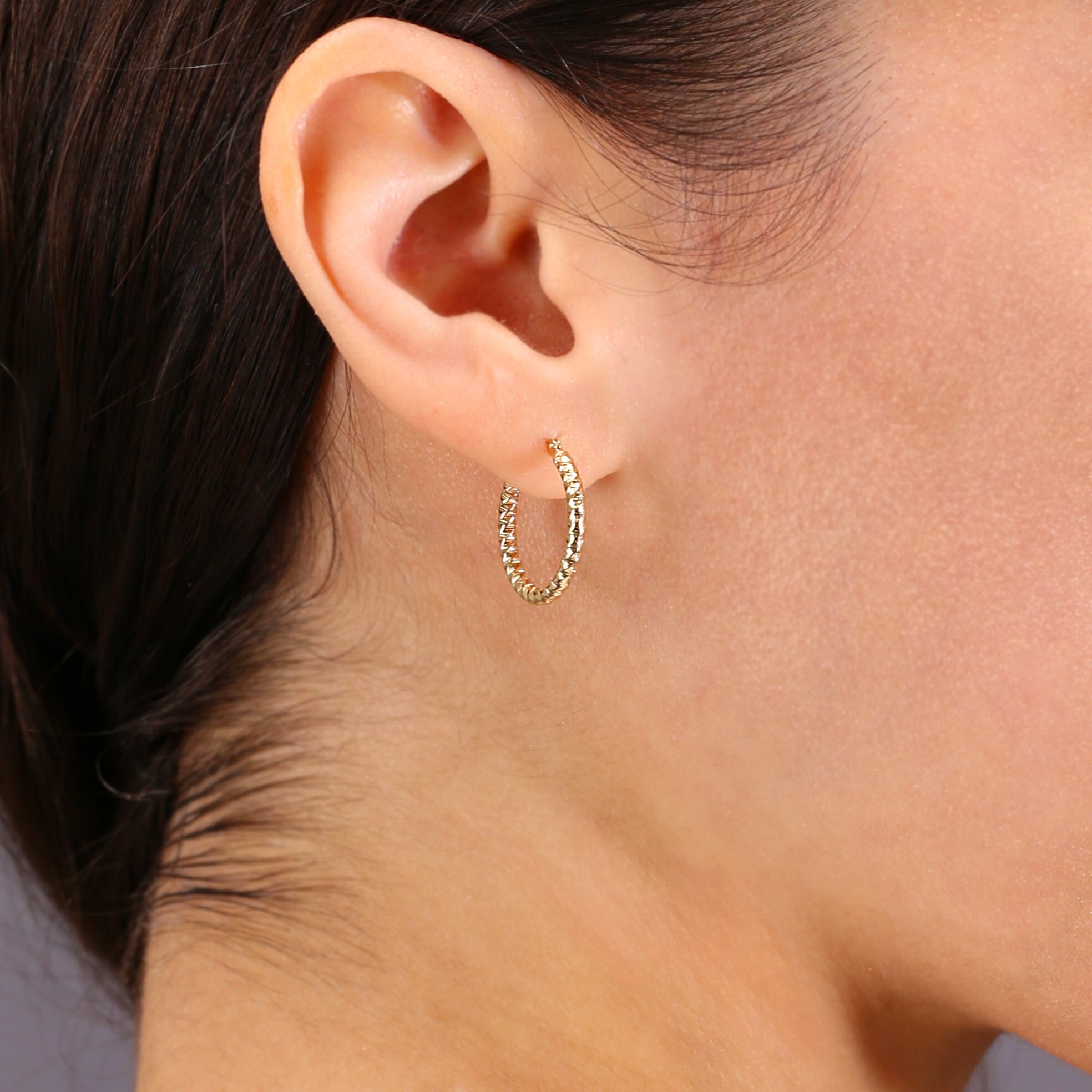 Orecchini a bottone Love Knot in oro bianco 14K: oro vero lucido e