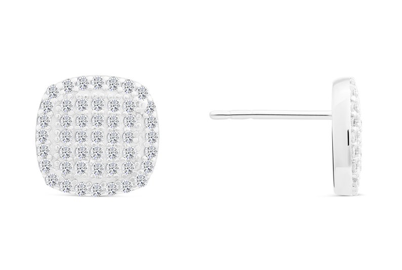 May include: A pair of silver stud earrings with a square-shaped design. The earrings are covered in small, clear stones.