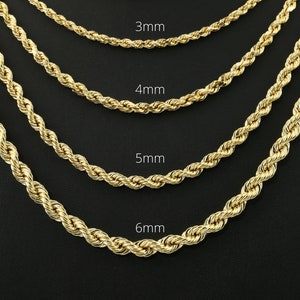 May include: Five gold rope chains of different thicknesses, laid out on a black surface. The chains are labeled with their thickness in millimeters: 2mm, 3mm, 4mm, 5mm, and 6mm.