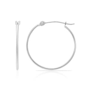 May include: A pair of silver hoop earrings. One earring is closed, and the other is open, showcasing the classic circular design. The earrings are made of a shiny, reflective metal, and are set against a white background.