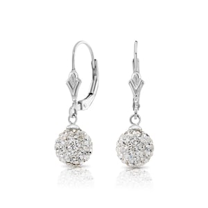 May include: Silver dangle earrings with a crystal ball design. The earrings have a lever back closure.