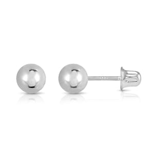 May include: A pair of polished 14k white gold ball stud earrings. One earring is shown from the front, while the other is displayed from the side, revealing the post and the secure screw-back mechanism with the 14K stamp clearly visible.
