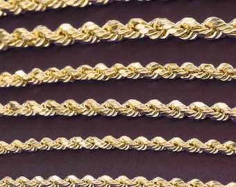 May include: Close-up of multiple gold rope chains, showcasing the intricate design and shine of the metal.
