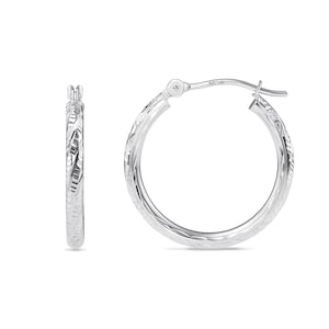 May include: A pair of silver-toned hoop earrings featuring a textured, diamond-cut pattern along the outer surface. The earrings have a hinged post closure mechanism and are marked with the text NY 14K near the hinge on the circular hoop.