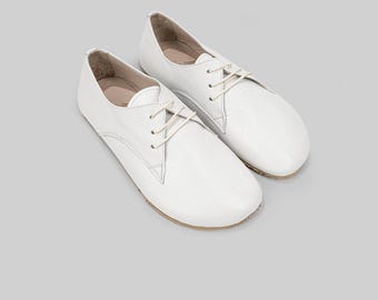 Oxford de cuero para mujer: estilo clásico, puntera ancha.