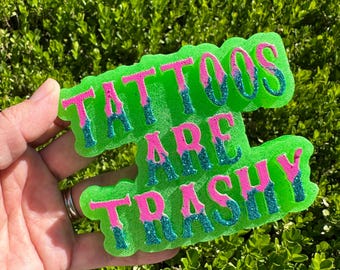 Green and Glitter Tattoos Are Trashy