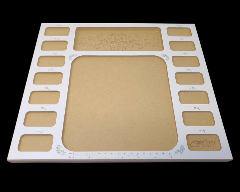 Angled view of the Acclaim Crafts Seed Beaders Dream Board showing the smooth surfaces, graphics, rounded edges, and layout.