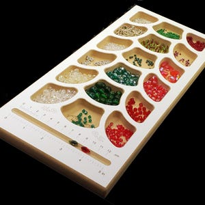 Acclaim Crafts Bead Stringers Pocket Board: wood, USA made with 18 1/2" deep pockets, in a nice, compact 6 3/8x15x3/4" size.