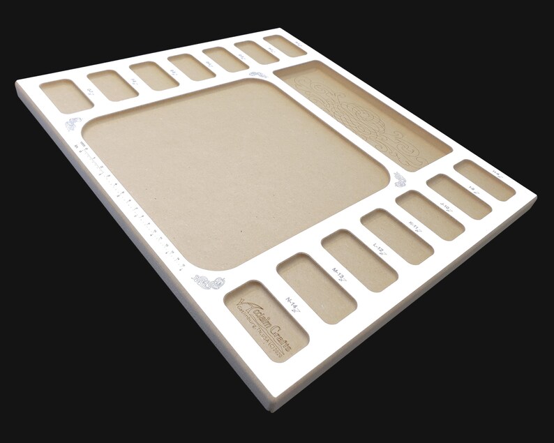 Angled corner view of the Acclaim Crafts Seed Beaders Dream Board with its smooth white surface, graphics, and rounded edges.