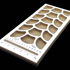 Acclaim Crafts Bead Stringers Pocket Board with a durable white surface, 18 pockets, and beautiful, high-contrast graphics.