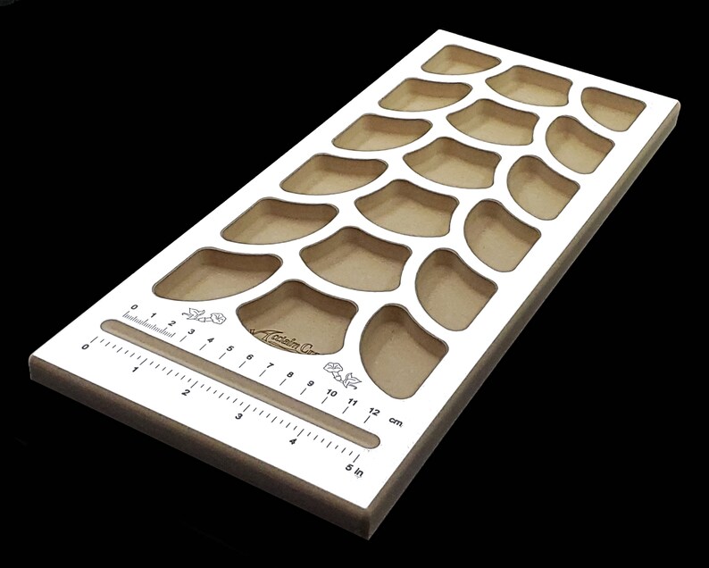 Acclaim Crafts Bead Stringers Pocket Board with a durable white surface, 18 pockets, and beautiful, high-contrast graphics.