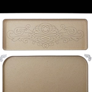 Close-up of the elegant laser-engraved scrollwork in the 1/2" deep tool pocket on the Acclaim Crafts Seed Beaders Dream Board.
