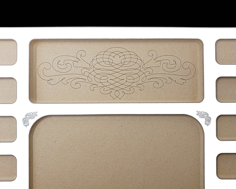 Close-up of the elegant laser-engraved scrollwork in the 1/2" deep tool pocket on the Acclaim Crafts Seed Beaders Dream Board.