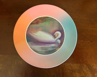 Plato de cisne giratorio del artista Sonigblue
