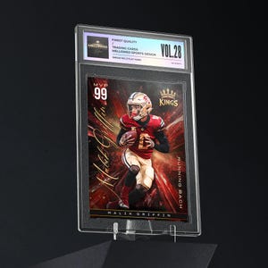May include: A graded trading card featuring Malik Griffin, a running back, in a red and gold uniform. The card is encased in a clear plastic holder with the text "MVP 99" and "Kings". The card is labeled "Finest Quality" and "Vol. 28".