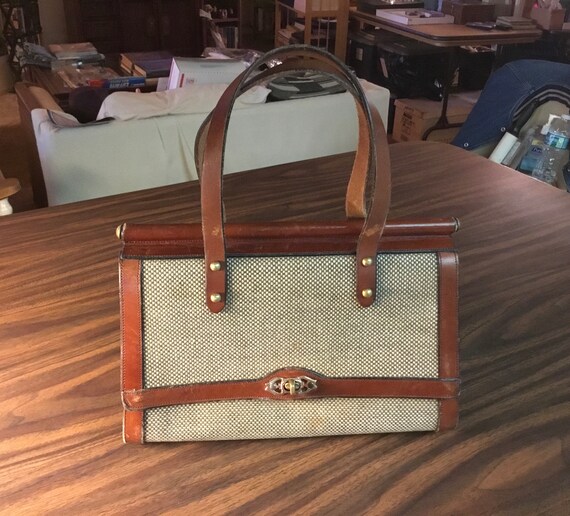 john romain handbag