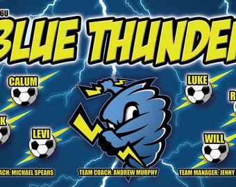 May include: A blue and yellow team banner with the words "BLUE THUNDER" in large yellow letters. The banner also includes the team's name, coach, and manager. There are images of soccer balls and lightning bolts.