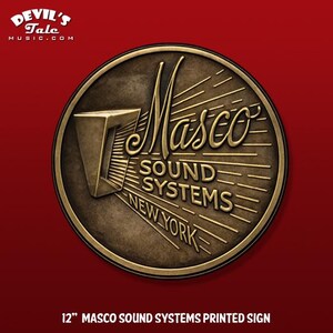 May include: A round, bronze-colored sign with the text "Masco Sound Systems New York" in a vintage style. The sign is 12 inches in diameter and has a textured appearance. The Devil's Tale Music logo is in the upper left corner.