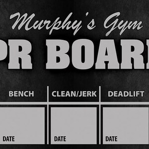 May include: A black and white chalkboard with the text "Murphy's Gym PR BOARD" and a barbell with weights on either side. The board is divided into eight sections with the headings "Squat", "Fr. Squat", "Bench", "Clean/Jerk", "Deadlift", "Clean", "Snatch", and "Date" for each section.