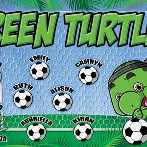 May include: Green Turtles soccer team banner with a cartoon turtle mascot kicking a soccer ball. The banner features a blue and white net with soccer balls and names of the players: Sofia, Emily, Camryn, Ruth, Alison, Aubriella, Kiran, and Meliza. The banner also includes the text "Coach Maritza".