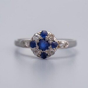 Solid Platinum Art Deco sapphire and diamond clustered ring