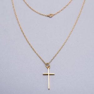 Solid 9K gold loose rope chain necklace with a 14K cross pendant