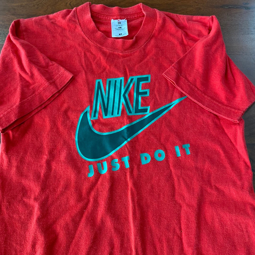 Pink nike just do it t shirt hot sale